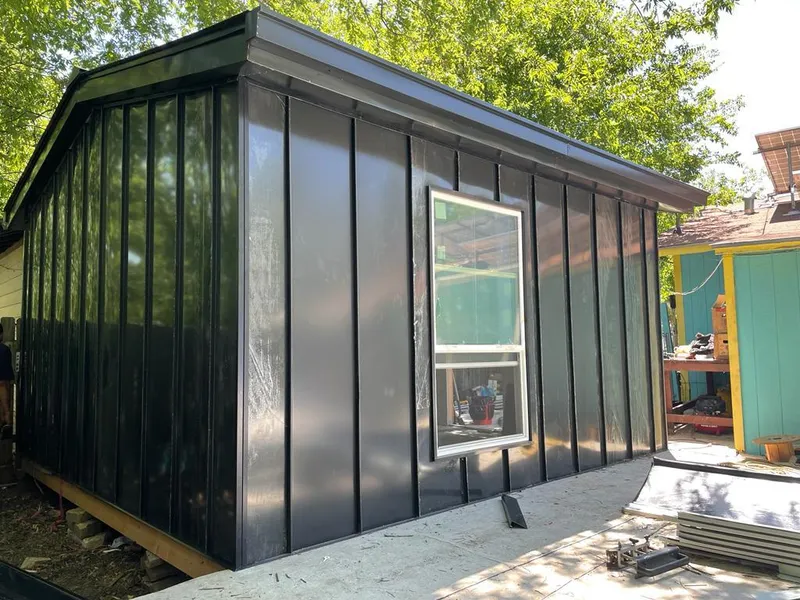 Black standing seam metal wall panels for Metal Roof Installation in Uniontown